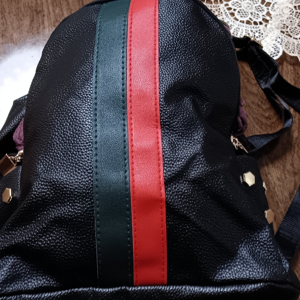 New without tags back pack style purse.